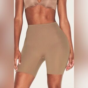 Hip Enhancing Mid Thigh Padded Shorts
SKIMS